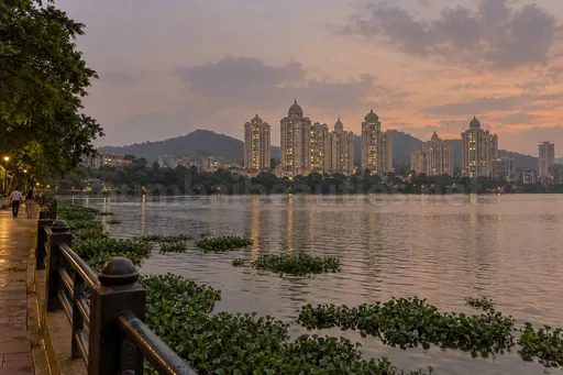 Powai Lake at dusk with the Hiranandani towers on the far side, Powai escorts service