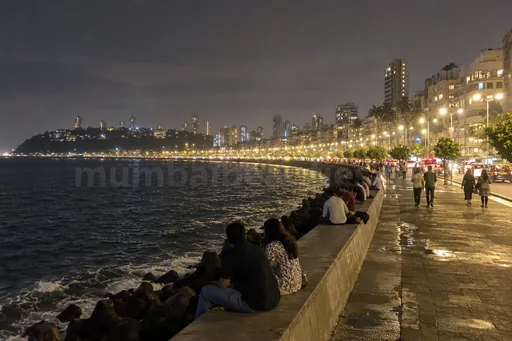 Marine Drive at night, the long curve of street lights along the dark sea – South Mumbai escorts